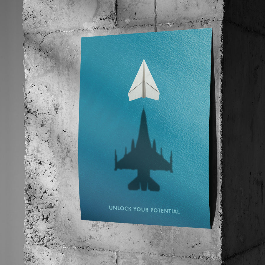 DOTCOMCANVAS Unlock Your Potential Poster an Betonwand
